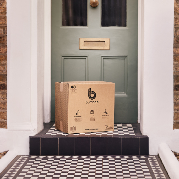 Box of bamboo toilet roll being delivered on doorstep.